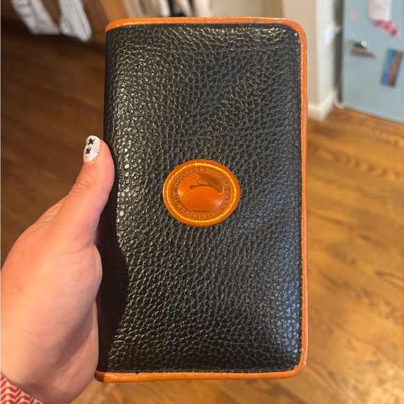 Dooney & Bourke Handbags - Dooney & Bourke Black and Orange Leather Wallet